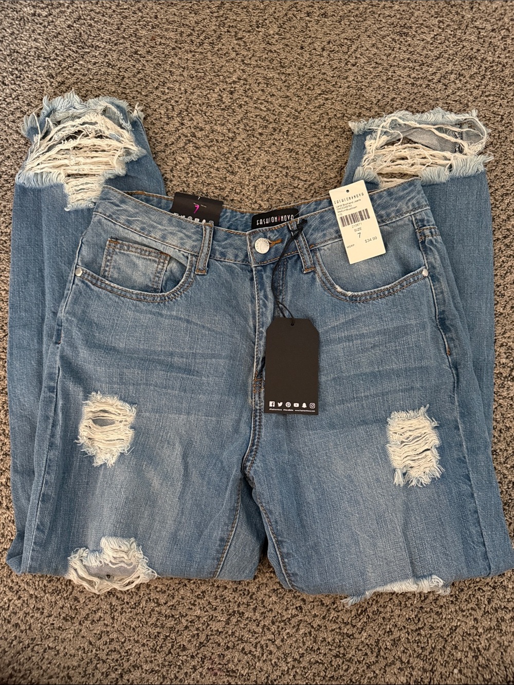 NWT Fashion Nova Women’s Distressed Light Blue Ripped Jeans